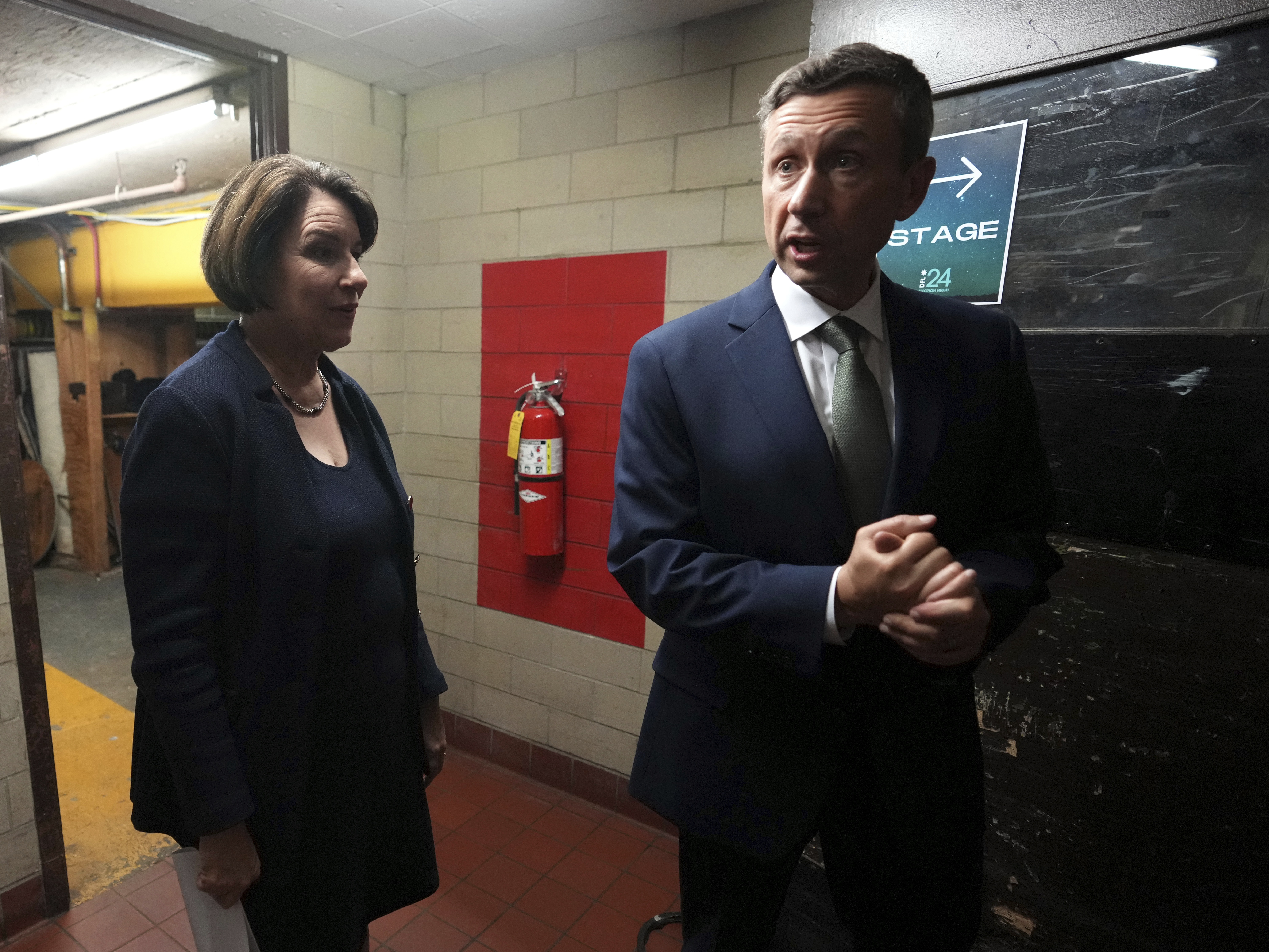 Minnesota Sen. Amy Klobuchar stands with state Democratic Party Chairman Ken Martin before speaking at the election night watch party on Nov. 5 in St. Paul.