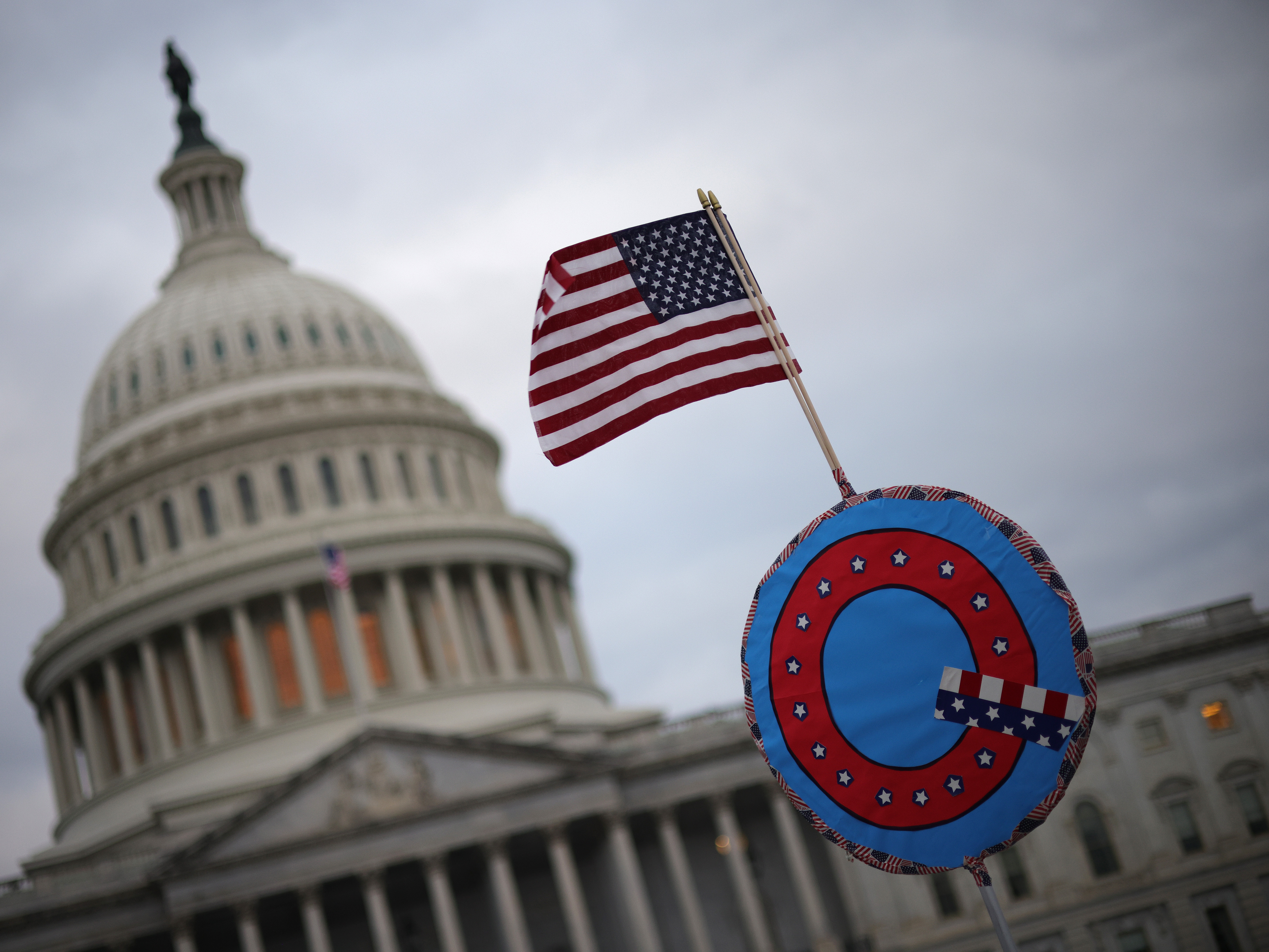 A QAnon sign at the U.S. Capitol on Jan. 6, 2021. Many of the rioters who attacked the Capitol later told investigators they were motivated in part by the online conspiracy theory.