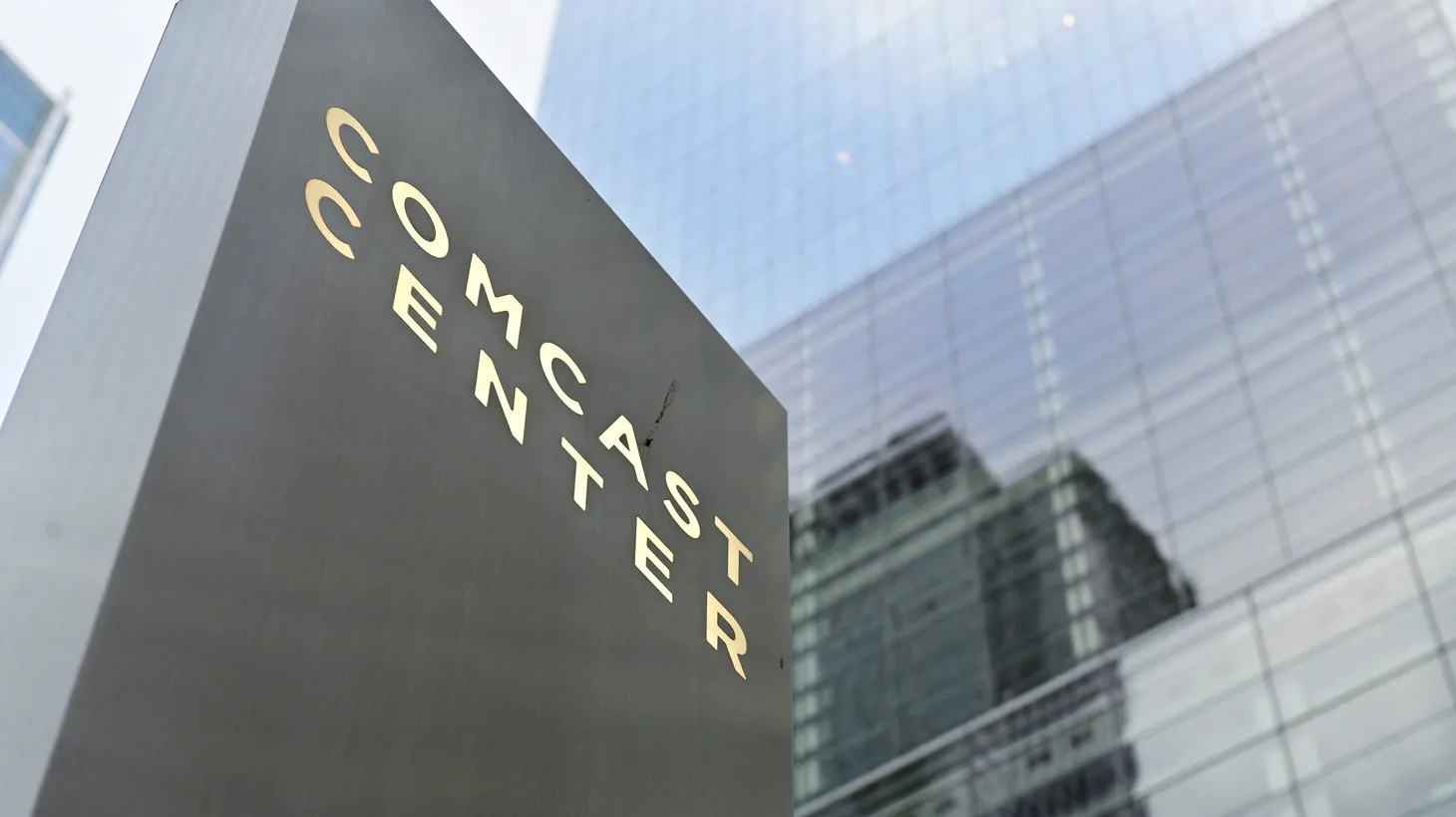 A view shows a signage at the corporate headquarters of Comcast, which announced plans to spin-off the bulk of its fading NBCUniversal cable TV networks, including MSNBC and CNBC, in Philadelphia, Pennsylvania, U.S. November 20, 2024.