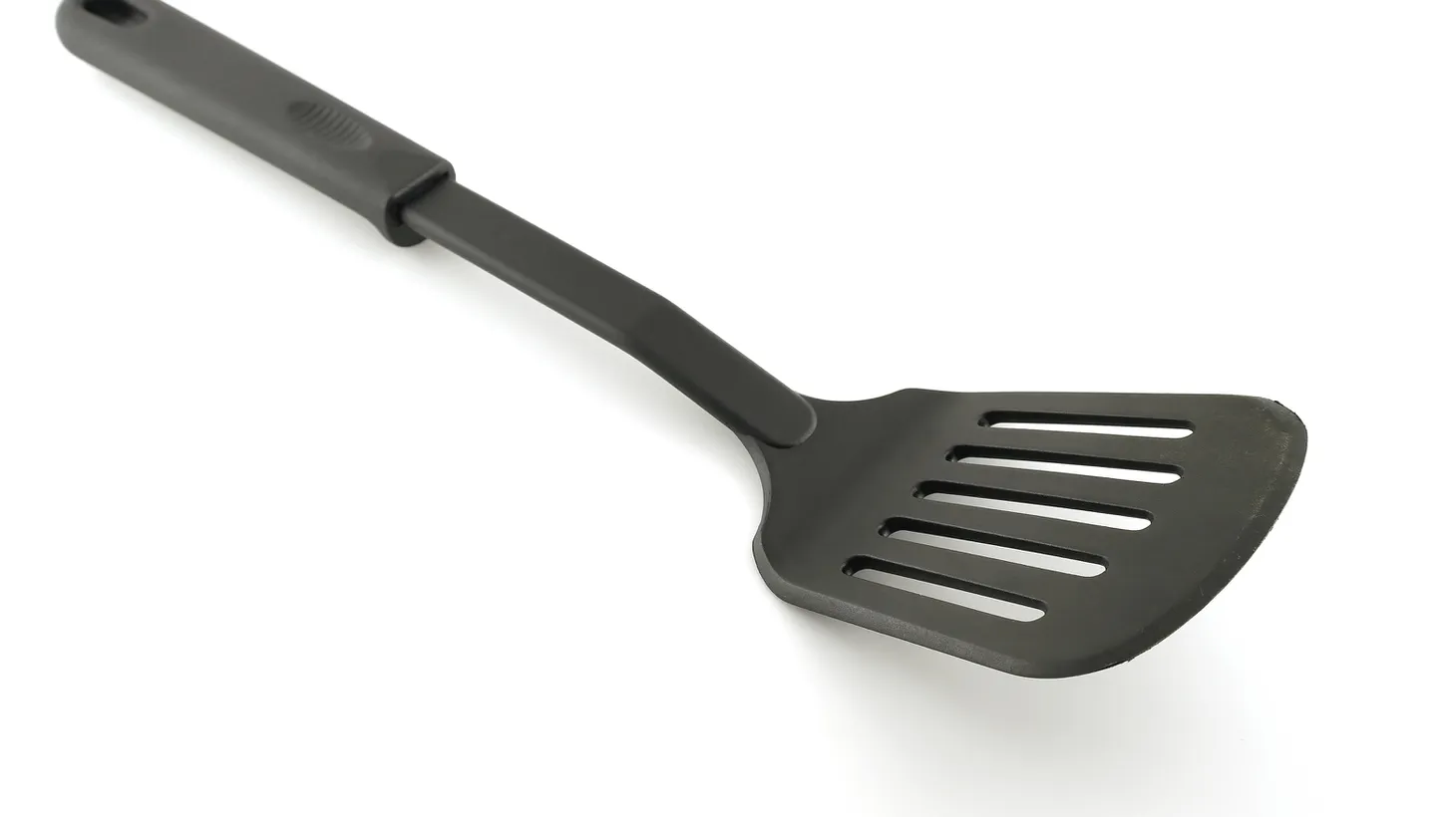 The flame retardants in plastic utensils can leach into food when they heat up as you're cooking with them.